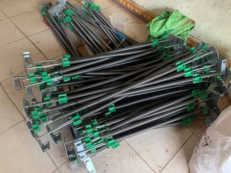 cấu tạo lò xo cuốn trong bạt che mưa tự động